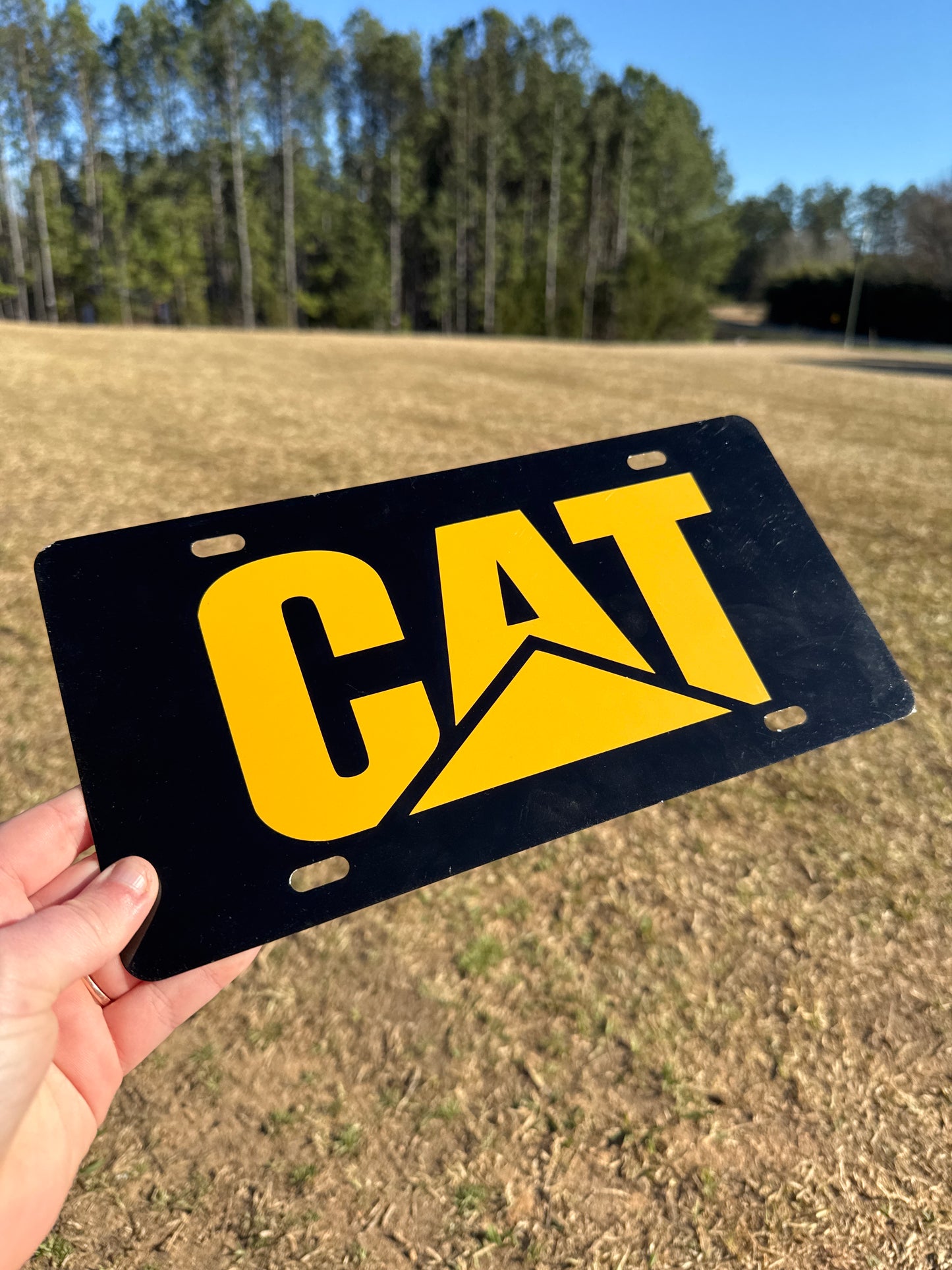 CAT Black/Yellow License Plate